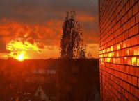 Foto: Bernd Langbehn<br>Glänzendes Rathausmauerwerk in der Abendsonne